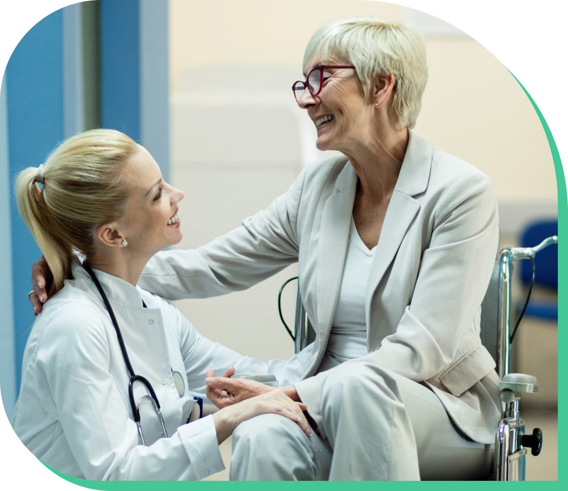 Nurse speaking with a resident in a skilled nursing facility